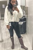 I think this is a super cute cardigan. It is looser, so even though I would usually get a M/L, I went for the S/M instead. The texture is really cool and a lot of people have asked to feel it when I wear it. I don't style it like the model does. I wear a tank or undershirt that doesn't show under it and use it more like a V neck sweater. Would definitely recommend! - Reena P.