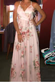The lavender looks more like a pink color. I do love the dress though.  It's quite long for my height even with heels, so I will need it hemmed.  The middle clip to hold the wrap dress together could be stronger. I will also have that altered. Overall, I do love the dress but I wish the lavender was not so pink. - Gabrielle D.
