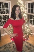I bought this dress in black a while ago and loved it so much I had to get the red for this holiday season! It didn't disappoint. I just wore it to a party last night and received so many compliments. I absolutely love how this dress fits and shows off all my curves but does it in a classy, retro way. The red color does tend to show more wrinkling than the black... the black is a little more photo forgiving. I grabbed a M but could've maybe sized up to allow a little more wiggle room. I do like things nice and fitted though so the M worked for me! All in all a great go-to dress that's made well. Props to the stretchy material too! I see more colors in my future! - Mindy Q.