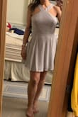 I usually wear a Large in Lulus. Being 5'10" I was afraid this would be a little short from the pictures and height of other customers but at sale price, it was worth the risk of the final sale. The length is good, not too short at all (wanted something I could potentially wear for a work celebration if necessary). The bust and midsection is a little large but I can easily have my mom take this in, or just add a decorated belt it to add more elegance to it and leave room for future growth (lol). - Ana D.