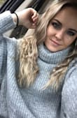 This sweater is big and comfy, but not too big! It's super soft and the turtle neck part isn't too right where I feel like I'm being choked. Loveeee itttt - Alexis C.