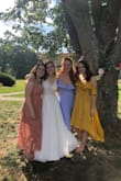 Overall, loved wearing this to my friend's wedding! The only thing is that you'll want to pin it closed...one gust of wind and I would've flashed the wedding party. No complaints otherwise and a ton of compliments! - Shelby B.