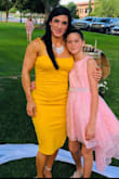 I wore this dress to a summer time wedding. It was extremely comfortable even though it is form fitting. The color attracted a lot of attention. I purchased and wore the small size and I have an athletic build from all of my years of weightlifting. I loved this dress! - IKSSA A.