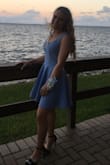 it was such an adorable dress i wore to my homecoming, the color is beautiful and the idea of it is nice. i'm a pretty small person and the top just fit me wrong and wasn't very flattering on me, also it didn't work very well for my homecoming but you could easily dress it up or down depending on what you need to wear it for. also the texture is a bit odd but i knew it was gonna be like that - Sarah R.
