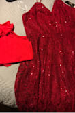 Stunning dress!! The fit is perfect except for I need a little more up top to fill it. Nothing a quick alteration can't fix! My only complaint is the red doesn't quite match the picture. My dress is more burgundy. It will work for what I need the dress for, but I was hoping for a brighter red. - Delia M.