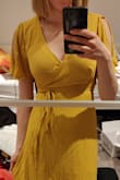 Thought this dress ran a little small, I'm usually a small in dresses, but thought it was a little too revealing around the top, maybe it was the way it was cut as well. Unfortunately was unable to return but if I went for the same dress again I would definitely order a M. Easily wrinkled, but nothing a quick iron won't fix. - Ãine C.