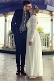 I bought this for my wedding. I had to have it hemmed because it was waaaay too long, but it fit beautifully other than that. The sleeves are also a bit loose, but I didn't bother having them altered. I got so many compliments on my dress! It's honestly perfect and I'm so glad I bought it. - Kiersten B.
