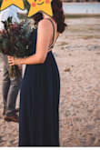 I bought this dress for engagement photos, and it was perfect! Flowy, beautiful navy color, and the slit was the perfect amount of sexy without showing too much. Only issue, was the top was pretty big, so it would definitely fit better getting the top sewn so you don't feel like you're exposed (I just did a safety pin for a quick fix). Overall, very happy with this dress! - Briana G.
