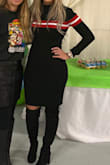The material of this dress is nice, stretchy. Very comfortable and soft. I love that it can be paired with boots or tennis for a more casual look. I ordered a Medium and it fit great. - Yajaira A.