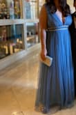 I bought it for my cousin's wedding and it's a really pretty dress. The only problem that I had with the dress is that it's too long and it runs a little large. Because of the dress was running a little bit large, I had to constantly fix the top part. - Alejandra G.