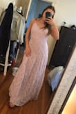 I got this dress to wear to a wedding next month. The color is perfect for spring! It's definitely too long and I need to have it altered because even with heels it's about 2 inches too long. Also I need to have it taken in near the cleavage area because it's too large. I did expect I would need to make these alterations as I am short and lacking cleavage lol. All in all, it's beautiful and perfect for a spring wedding! - Alexis R.