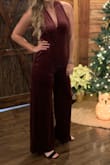 Being 5'11 it is hard for me to find jumpsuits especially because a lot of my height is in my torso. This was the most comfy jumpsuit I have ever worn I did not want to take it off! The slit at the front did come down a little too low for my liking, but I sewed it together about 2 inches and no one could tell and I felt more comfortable! Got tons of compliments. - Sierra S.
