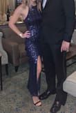 Love the sparkle, love the neckline and cut, and love the length! I wore it to a November wedding in NY with black heels, a black bag, and a black fur mini coat. - Amy C.