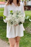 I got this for my bridal shower and it was absolutely perfect!! I ordered a medium and it was the perfect amount of flowy! I got so many compliments, it's one of my favorites that I've ordered! Ps I have a sash on over the dress! - Amy B.