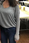 This shirt has been a staple in my fall/winter wardrobe. It is very light weight but it's perfect for layering and I love the way it falls. Long enough to wear with leggings but I like to tuck it in sometimes too! - Chloe R.