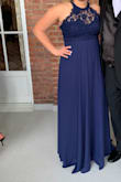 The dress overall fit to size! It was kind of big in the chest area but I didn't need to alter it or anything. It ran a little bit longer than I would have liked. Overall it was a good purchase for a black tie wedding in the summer! - Allie B.