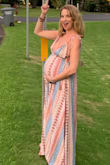 Wore this gem on my babymoon in Hawaii. It fit great even with bump. I got so many compliments and felt so comfortable. The straps are a bit long and annoying to tie but once tied they stay tied, no surprise boob pop out. - Rebecca S.