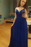 It fits perfectly! Especially on the back. Didn't expect the dress to fit this good. A bit long, but that was expected, I'm a shorty! :) - Karine H.