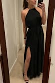 Absolutely love this dress! Length is absolutely perfect. I'm 5'7" and it just touches the floor without heels on. Wearing to a formal wedding. - Devon C.