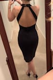 This dress is AMAZING. I bought a small thinking it could be a little too tight but it's PERFECT. I would say it runs a tad bit large but it's not like dangling off me. The back is absolutely beautiful too. It is a high neck but it sits low enough on your chest that it doesn't choke you. - Devon C.