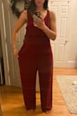 DO NOT BUY THIS!!! I truly thought there was a mix up in size because of how insanely ridiculous this looked on me. I am 5'10 athletic build and this jumpsuit sagged everywhere possible. Pant legs were at least 4-5 inches too long, inseam the same. Waist seemed to be closer to a size 14-16, even fully zipped up the entire jumpsuit was so large and saggy the shoulders were practically falling off. I have NEVER ordered something so untrue to size. - Annette K.