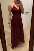 Bought this dress for a formal wedding. I ended up returning it for a couple reasons. It does fit true to size but there is so much fabric and doesn't drop straight down like I was expecting. The dress is very long. I'm 5'7" wearing a small and it still dragged on the floor with 3 inch heels on. Possibly a different color would've been better! - Devon C.