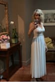 I was so pleased with this dress! It fit perfectly. I did have the length hemmed. Fabric is good quality and chiffon flows so nicely. I had to pack in suitcase and it barely wrinkled. I wore it with strappy gold sandals, vintage gold beaded evening bag and faux fur ivory shawl/wrap. - Erica T.