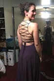 This dress is AMAZING! I kept going back and forth between ordering M or L due to my height but I'm thankful I went with Medium because it was perfect! It was just slightly loose but the back straps pull tightly and made it fit perfectly. I am completely flat chested so I always struggle with finding a dress that doesn't have a loose breast area and this didn't. It laid flat perfectly without any weird baggy spots. It's very flattering. The back is amazing and very sturdy. Putting it on was a breeze and my husband tightened it up easily. We wore it to a Military Gala and I got lots of compliments. Oh and I'm 5'10" and wore 3 inch shoes and it still hit the ground! - Viviana F.