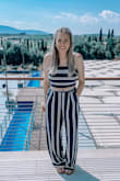 So I ordered a small and although the medium might have fit better, I'm okay with the small. It's true to size. Maybe even runs a tad bigger. (I just have bigger boobs) Either way, this was an amazing choice for my school Greece trip and I got so many compliments!! Thanks Lulus. - Aleyna W.