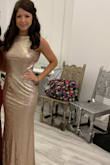 This dress is amazing. I ordered a size up (M), because I knew it would be tight around the waist/belly area if I got a small. The chest area is a bit loose though, but it can be fixed. Love love love it! I did notice that the sequins started falling off as I was putting on the dress and when I took it out of the packaging, but nothing awful. - Jovana K.