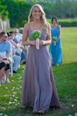 Loved this dress, I wore it as a bridesmaid dress and it was perfect! I would describe the color as more of a light/dusty purple then a taupe which was exactly what I was looking for. It fit true to size and was great quality - it was very heavy with a lot of layers to it! - Robyn O.