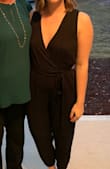 This jumpsuit was just what I needed! I wanted something that could be a little more casual for my graduation in the morning then transform to fun and sexy for a Christmas party, and it hit it out of the park! The cinched ankles made it super flattering and it was all around comfortable. Since it had a tie waist, that helped to adjust it in size and tightness. It's definitely low cut but very flattering. Since I'm tall the waist fell a little higher than my natural waist, but I think the large would've been too baggy so I'm glad I didn't size up. I'm not sure how the material will hold up after washing as it already had a few small threads coming out, but it wasn't very expensive so nothing that I didn't totally expect. All in all super happy with the purchase, I looked bomb. - Abbey M.