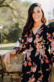 I love this dress. Ordered it for a Fall engagement shoot. I normally wear a medium but it was out of stock so took a risk and ordered a small. It fit great. A little short but most shorter dresses are on me because I'm tall and my legs are long! I did what another reviewer said and sewed up the v plunge neckline with black thread to make it more modest looking and it looked great! - Charlotte I.
