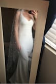 Wow! I used to work at a boutique bridal store and the quality of this dress is just as good. Feels like crepe material which is what high end dresses are made out of for the simple dresses.. I'm going to have a seamstress get rid of the adjustable strap. Will be perfect for my elopement wedding in Mexico - Kayla M.