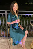 I wore this dress for two holiday parties and got tons of compliments! I had to steam it to get wrinkles out, but then it was beautiful. Such a flattering cut, and the fabric helps the wrap style stay together. - Sarah L.