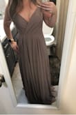 I bought this for a wedding (next year) but I'm so surprised with the quality of this dress! I'm short (4'11) so it will of course need to be altered hemmed, but it's perfect otherwise. I love that it has adjustable straps since I'm so short. The color is darker than I expected in a good way. Can't wait to wear this for the wedding! - Sarah F.