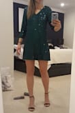 Such nice material and the sequins feel soft. Wish the width was a bit narrower and length longer. I'm 5'8 and it cane up to my mid-upper thigh. If I put my hands up, the bottom of the dress came up half way up my butt. Kind of like a long t shirt on me and not long enough to be a dress. Will be returning because I can't wear it. Really too bad. I'd recommend this if you're average to short height - Sabrina G.