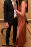 This dress is sexy and classy. Wore it to a work Xmas party. Had to pin it in the busy area but love the color and the slit! - Sonia P.