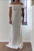 This dress is clean and neat looking. It'd definitely be flattering to all body shapes. It is a little loose due to the stretch, I could've sized down. - Tanessa P.