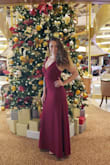 I wore this on the last night of the cruise. I had to sing a musical number for a competition and it caught everyone's eye as I walked by. It is truly beautiful. It is a fire red and the dress itself is great quality for the cost. - Ashley M.