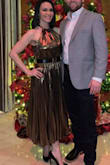 After reading the previous reviews I went down a size and it fit perfectly! I received so many complements at my company Christmas party! This dress is by far my favorite holiday dress. - Renee B.