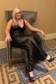 This dress, wow. I purchased it on sale, but let me say I would pay full price if not more. The length was perfect for me. I'm 5'2 and I wore 5" pumps and it still touched the ground. The fit was amazing, it hugged everywhere but was not uncomfortable especially when I sat down. The quality is in the fabric as the dress is heavier than most but not too heavy. The sequin also did not bother my arms. I received countless compliments on this dress. Trust me you won't be disappointed. - Brittany P.