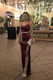 The dress looks very simple, but OMG it is GORGEOUS!  This dress made me feel like a star.  I am a short girl, but with 5" heels, I need no alterations.  Great fit all over.  Thanks Lulu! - Mateera K.
