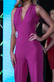 This jumpsuit fits perfect, does show some cleavage, but very tastefully. - Lisa K.