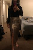 So I am usually a size medium in Lulus skirts but they only had a small available. It fits perfectly! The hips are stretchy Which is perfect for me. The waist is still fitted because it does have a zipper and clasp. But if you have large hips and a smaller waist this will definitely work in a size down. - Leah M.