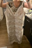 I'll admit I did size up because I didn't want it to be super tight but this dress is huge. I ordered another dress in a large from Lulus with the same measurements that fit perfectly. This dress was also really long. - Beth E.