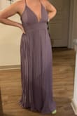 I sized up on this. I'm generally a medium but order a large online just in case. This dress fits PERFECTLY. and it is so comfortable! I'm not normally a girl that can go without a bra but I definitely can in this dress. It is long but since I'm almost 5'6" I'll just wear heels and don't even have to get it altered. I am so excited to wear this as a bridesmaids. I almost bought a 200 dollar basic ugly dress but waited out and ordered this and couldn't be happier. - Beth E.