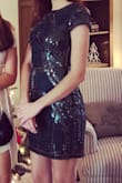 I wore this dress (in green) to a holiday event, and it was absolutely gorgeous! It fits very nicely and the quality of the dress and embellishment is better than I anticipated. The color is a true emerald green and was perfect for the holidays. - Leah S.