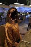 Material is soft both on the inside and the outside. The tie on the bottom side adjusts the tightness, would also be cute worn over a snug black dress! - Lauren T.