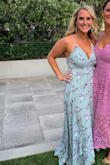 I LOVED this dress. I ended up going to a seamstress and having her add cups to it so I didn't have to wear a bra. It was the perfect mix of flirty / sexy / classy! - Laura S.